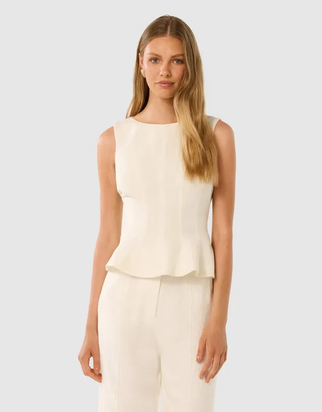 An elegant peplum top in porcelain white. This top can work with skirts, pants and jeans and is a perfect base layer with a point of difference.
