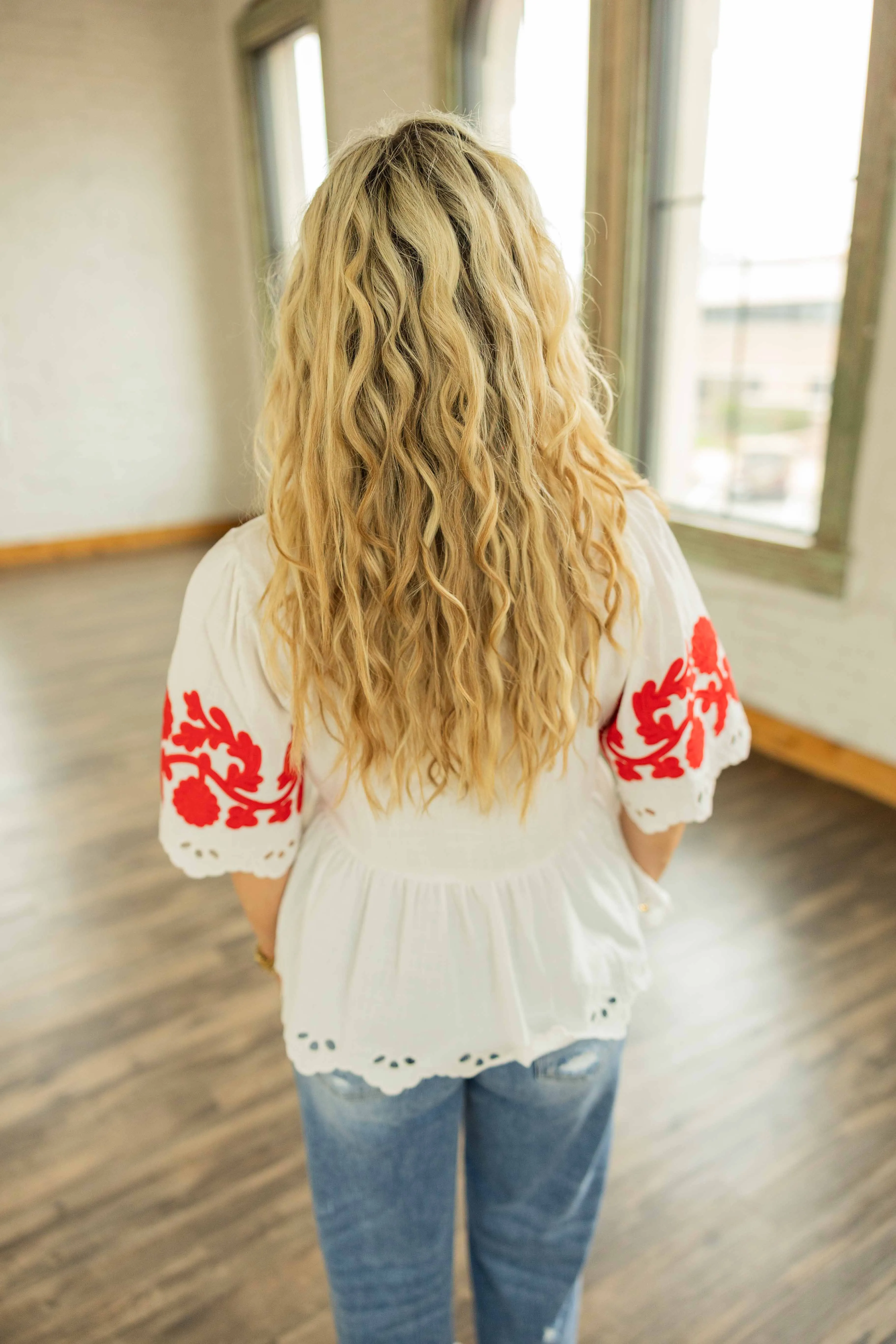 MARTHA PEPLUM EMBROIDERED EYELET TOP