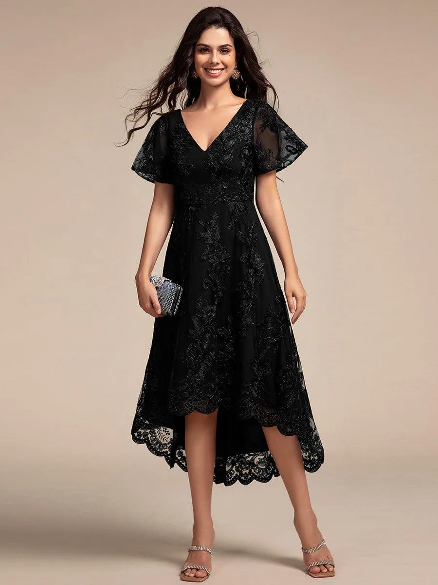 Robe d'invitée de mariage mi-longue à manches courtes et col en V double en maille brodée