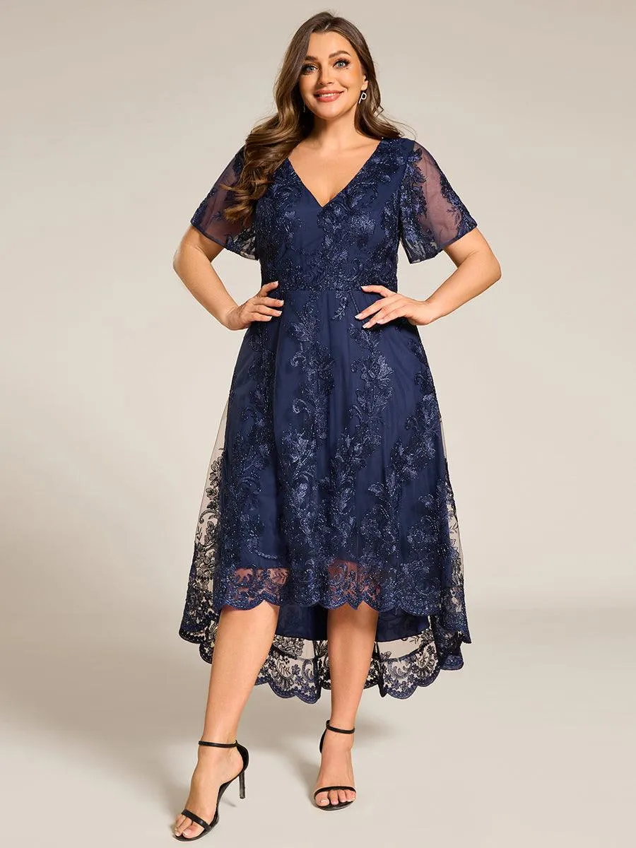 Robe d'invitée de mariage mi-longue à manches courtes et col en V double en maille brodée