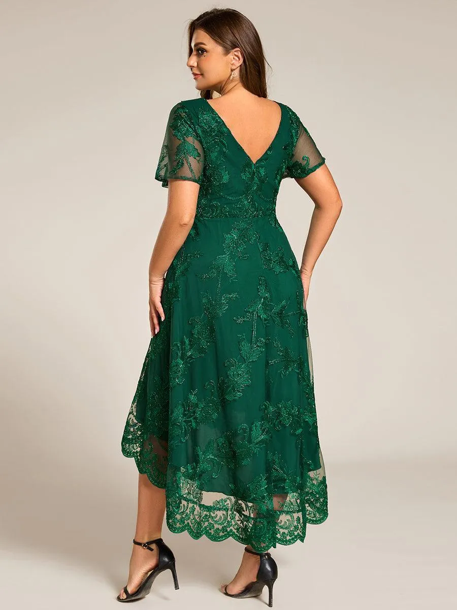 Robe d'invitée de mariage mi-longue à manches courtes et col en V double en maille brodée