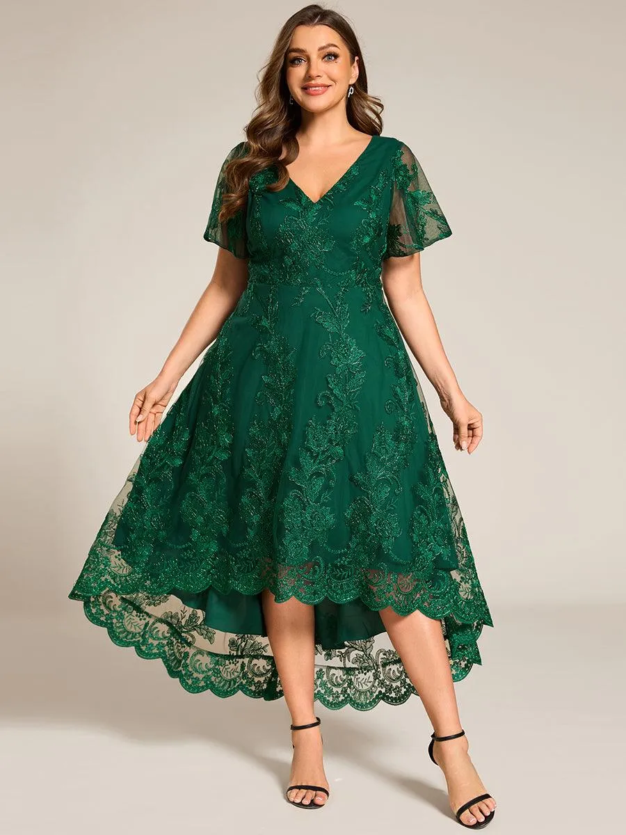 Robe d'invitée de mariage mi-longue à manches courtes et col en V double en maille brodée