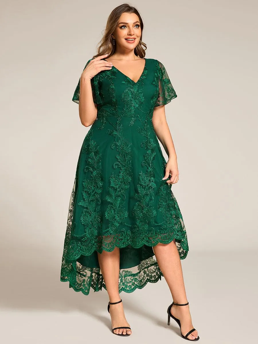 Robe d'invitée de mariage mi-longue à manches courtes et col en V double en maille brodée