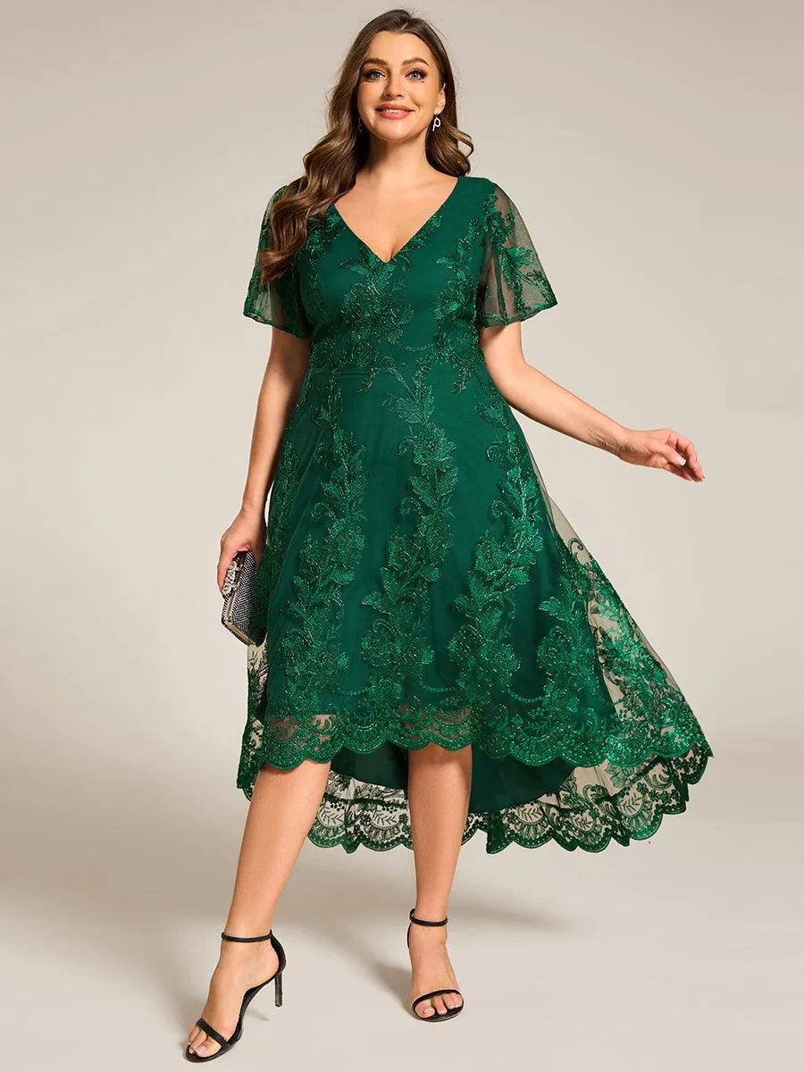 Robe d'invitée de mariage mi-longue à manches courtes et col en V double en maille brodée