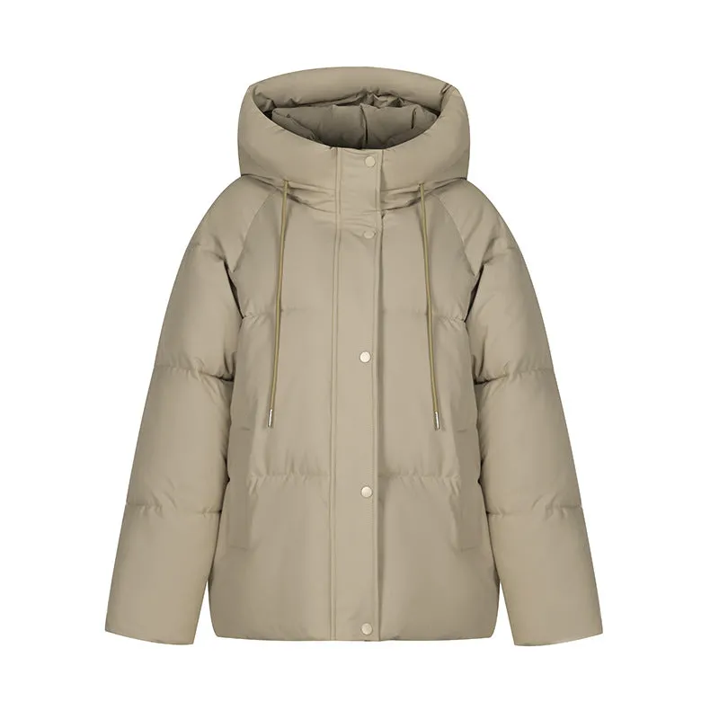 Stylish hooded puffer jacket for women with a relaxed-fit and zip-up closure