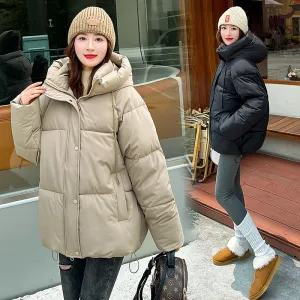 Stylish hooded puffer jacket for women with a relaxed-fit and zip-up closure