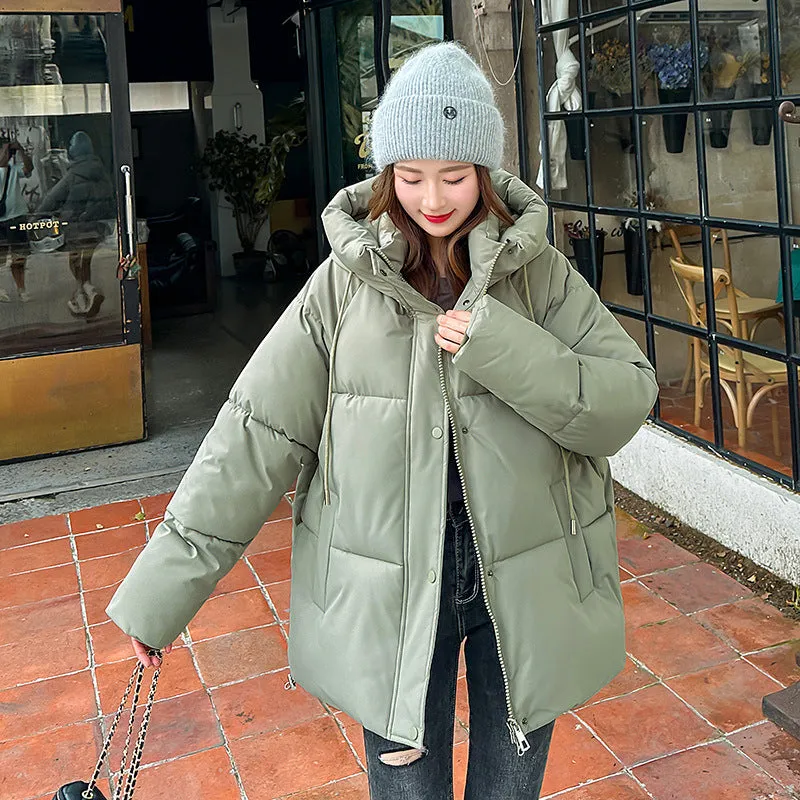 Stylish hooded puffer jacket for women with a relaxed-fit and zip-up closure