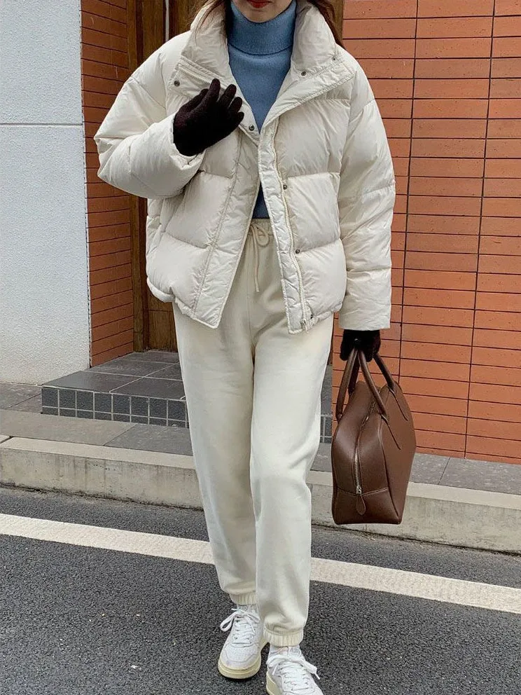 Women's Quilted Puffer Jacket with Windproof Features and Slash Pockets